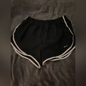 Nike DriFit shorts in black. Size large.